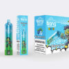 Blueberry Ice vape packaging featuring a blue disposable vape, matching box, and a larger carton, all with vibrant cartoon-style graphics, including a green zombie character and a nicotine warning label.