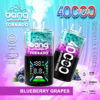 A graphic design showcasing a disposable vape device named "Bang Tornado" with a flavour description of "Blueberry Grapes." The device features a modern design, digital display, and indicators for adjustable power and puffs. It highlights a capacity of 40,000 puffs, 40 ml volume, an 850 mAh battery, and Type-C charging compatibility. Blueberries and grapes are illustrated alongside the device.