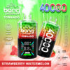 A promotional image for a vape device featuring the "Bang Tornado" disposable vape with a strawberry watermelon flavor. It displays graphics including "40,000 puffs," adjustable power settings, and technical specifications such as a 40 ml volume and 850 mAh battery, alongside images of strawberries and watermelons. The background features a gradient of green and orange.