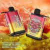 Two colourful disposable vape devices with vibrant designs lying on a fiery orange background, featuring branding text and specifications like puff capacity and battery details prominently displayed.