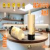 Two beige and black disposable vape devices with cartoon dog graphics on a kitchen island, surrounded by icons and text highlighting features like 856 puffs, 3 in 1 adjustable flavors, 600mAh battery, and Type-C charging.