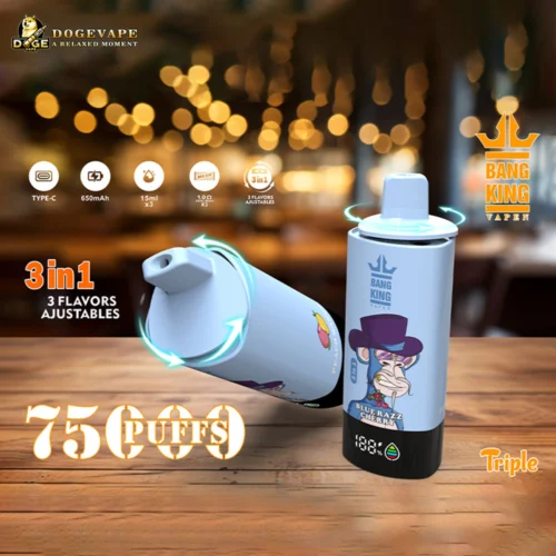 Two Blue Disposable Vape Devices With Purple Monkey Illustrations, Labeled Bang King Vapen And Blue Razz Cherry Flavour, Shown On A Wooden Surface With Bokeh Light Background, Highlighting 3-In-1 Adjustable Flavours, 75 Puffs, Type-C Charging, 650Mah Battery, And 15Ml Capacity.