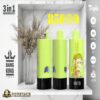 Three lime green vaping devices with black bottoms displayed on a white marble shelf, featuring flavors grape ice, mixed berries, and mango peach, with product details like 85 puffs, type-C charging, 600mAh battery, and 3 adjustable flavors, alongside a vase with dried flowers and Bang King Vapen and Dogevape logos.