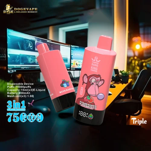 Two Pink Vape Devices With Black Bases On A Dark Desk In A Modern Office, One With A Monkey Graphic And 'Strawberry Watermelon' Text And The Other With Blueberry Graphics And 'Blue Razzie' Text, With Multiple Computer Monitors And Office Chairs In The Background.
