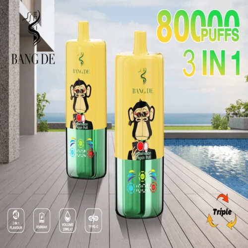 Promotional Image Of Bang De Electronic Vaping Pods With A Yellow And Green Design Featuring Cartoons Of A Monkey Holding Fruit, Placed On A Wooden Deck Overlooking A Pool, Advertising Features Such As '80000 Puffs' And '3 In 1'.